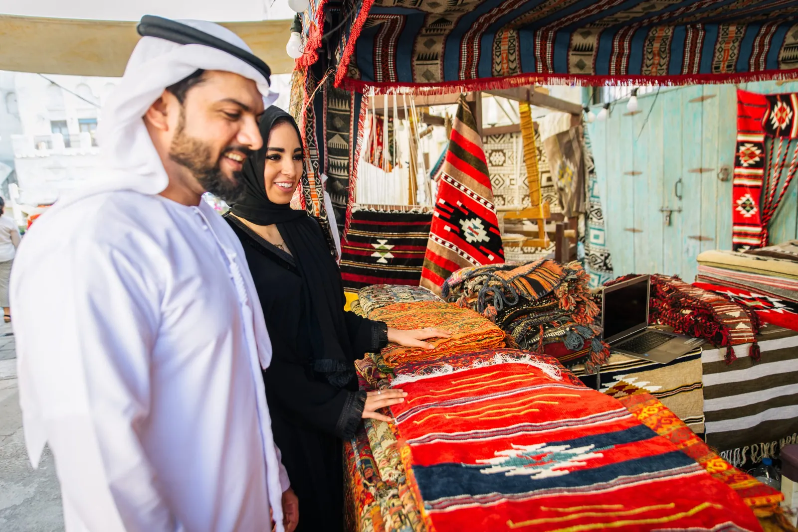 Couple exploring a traditional shop in the UAE
